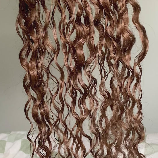 warm medium brown curly extensions