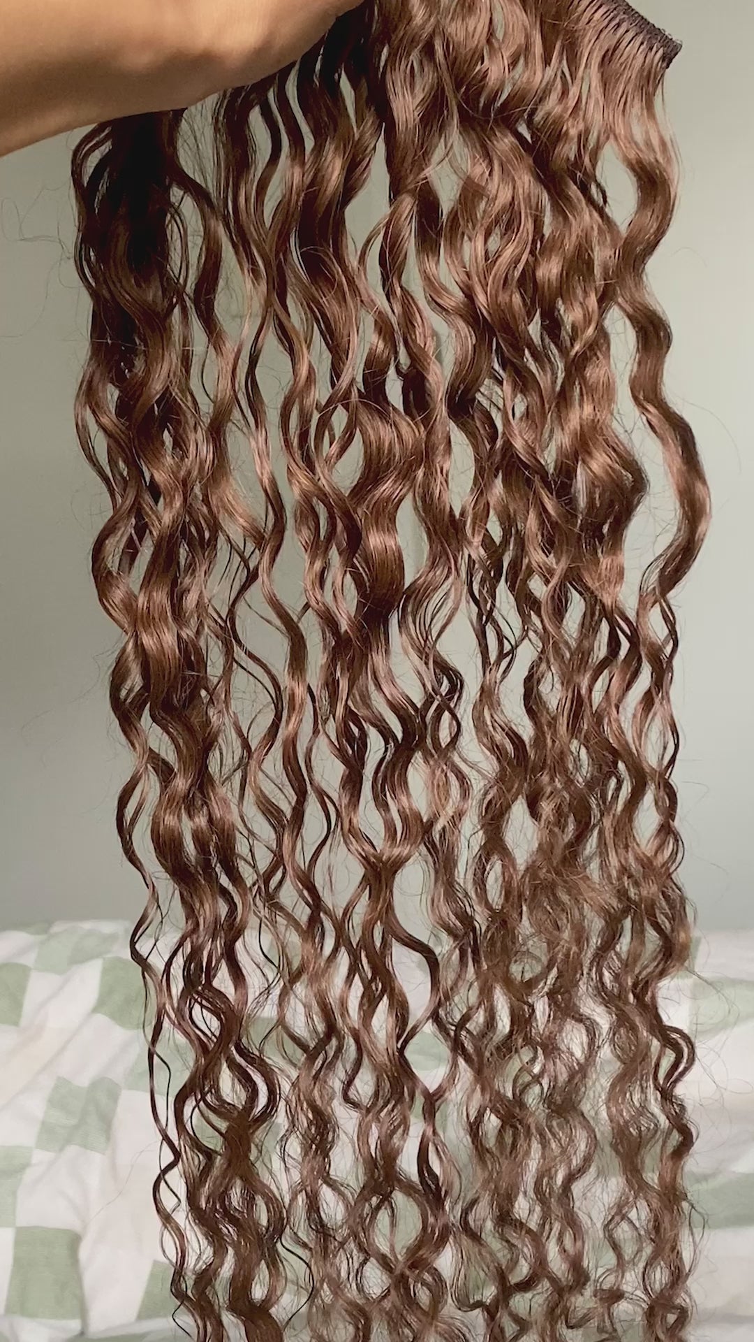 warm medium brown curly extensions